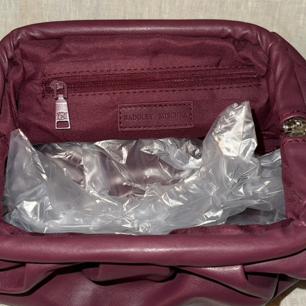 NWT Badgley Mischka Wrapped Frame Clutch: Plum
Perfect fall bag - Picture 9 of 9